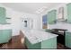 Eat-in kitchen with island and view to living room at 631 Cottage Ave, Indianapolis, IN 46203