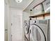 Laundry room with LG washer and dryer, and shelving at 9545 Bay Vista W Dr, Indianapolis, IN 46250