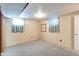 Unfinished basement with carpeted floors and neutral walls at 104 Mohawk Ln, West Lafayette, IN 47906