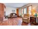 Cozy living room with hardwood floors and patio access at 104 Mohawk Ln, West Lafayette, IN 47906