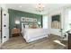 Spacious bedroom with green accent wall and large windows at 18322 Depoe Ln, Westfield, IN 46074