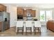 Kitchen boasts an island with seating and stainless steel appliances at 18322 Depoe Ln, Westfield, IN 46074