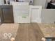 Selection of flooring, cabinetry, and countertop materials for the home at 18322 Depoe Ln, Westfield, IN 46074