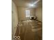 Bright bedroom featuring a window and neutral walls at 9130 Tansel Crk Dr, Indianapolis, IN 46234