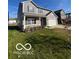 Two-story house with gray siding, white trim, and a landscaped yard at 9130 Tansel Crk Dr, Indianapolis, IN 46234