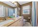 Bathroom with double sinks and granite countertop at 595 Hawthorne Dr, Carmel, IN 46033