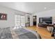 Spacious main bedroom with access to private office and patio at 595 Hawthorne Dr, Carmel, IN 46033