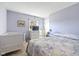 Serene bedroom with a crib and ample space at 595 Hawthorne Dr, Carmel, IN 46033