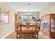Bright dining room featuring a wood table and built-in hutch at 595 Hawthorne Dr, Carmel, IN 46033