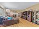 Gathering room with a fireplace and built-in shelving at 595 Hawthorne Dr, Carmel, IN 46033