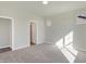 Bright bedroom with bathroom access and carpet at 7149 Rose Hill Ave, Brownsburg, IN 46112