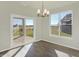 Dining room with hardwood floors and patio access at 7149 Rose Hill Ave, Brownsburg, IN 46112