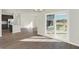 Open concept dining room with kitchen and patio access at 7149 Rose Hill Ave, Brownsburg, IN 46112