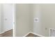 Convenient laundry room with hookups and storage at 7149 Rose Hill Ave, Brownsburg, IN 46112