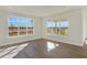 Spacious living room with large windows and plenty of natural light at 7149 Rose Hill Ave, Brownsburg, IN 46112