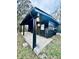 Newly painted home with a covered patio and concrete patio at 2442 N Franklin Rd, Indianapolis, IN 46219