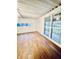 Bright finished basement with vinyl flooring and large windows at 2442 N Franklin Rd, Indianapolis, IN 46219