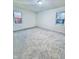 Spacious bedroom with grey carpet and dual windows at 2442 N Franklin Rd, Indianapolis, IN 46219