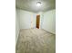 Bright bedroom featuring grey carpet and double closets at 2442 N Franklin Rd, Indianapolis, IN 46219