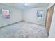 Spacious bedroom with grey carpet and ample natural light at 2442 N Franklin Rd, Indianapolis, IN 46219