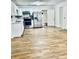 Modern kitchen featuring stainless steel appliances and wood-look flooring at 2442 N Franklin Rd, Indianapolis, IN 46219