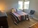 Bright bedroom with a comfortable bed and plenty of natural light at 11155 Baywood Ln, Indianapolis, IN 46236