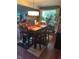 Dining room with a wooden table and six chairs at 11155 Baywood Ln, Indianapolis, IN 46236