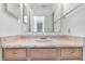 Clean bathroom with single sink vanity and mirrored medicine cabinet at 12564 Geist Cove Dr, Indianapolis, IN 46236