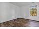 Well-lit bedroom, wood floors, and a window with a view at 12564 Geist Cove Dr, Indianapolis, IN 46236