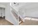 Elegant staircase with white railings and wood steps at 12564 Geist Cove Dr, Indianapolis, IN 46236