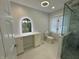 Elegant bathroom featuring a double vanity, hexagon tile, and glass shower at 2413 Griton Ct, Shelbyville, IN 46176