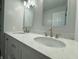 Modern bathroom with double vanity, quartz countertop, and updated fixtures at 2413 Griton Ct, Shelbyville, IN 46176