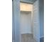 Walk-in closet with hanging rod and carpeted flooring at 2413 Griton Ct, Shelbyville, IN 46176