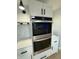 Stainless steel double wall oven with sleek modern design in updated kitchen at 2413 Griton Ct, Shelbyville, IN 46176