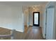 Bright entryway with hardwood floors, a stained glass door, and an open concept at 2413 Griton Ct, Shelbyville, IN 46176