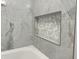 Bathroom shower niche with unique mosaic tile detail at 2413 Griton Ct, Shelbyville, IN 46176