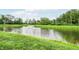Serene pond with fountain in a green space at 1095 Bevy Blvd, Danville, IN 46122