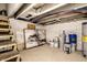 Unfinished basement area with exposed brick and storage at 1621 Draper St, Indianapolis, IN 46203