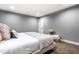 Calming basement bedroom featuring a comfy bed and soft color palette at 1621 Draper St, Indianapolis, IN 46203