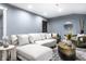 Finished basement boasts a spacious living area with comfortable sectional sofa and stylish decor at 1621 Draper St, Indianapolis, IN 46203