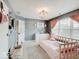 Well-lit bedroom featuring a daybed and gray walls at 2912 Abbotsbury Ct, Greenwood, IN 46143