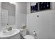 Clean bathroom with white subway tile and a pedestal sink at 3628 Planck Cir, Danville, IN 46122
