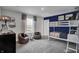 Bedroom with a bunk bed and a navy blue accent wall at 3628 Planck Cir, Danville, IN 46122