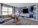 Spacious Gathering room features a large TV, comfortable seating, and water views at 3628 Planck Cir, Danville, IN 46122