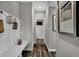 Bright hallway with bench, storage, and powder room at 3628 Planck Cir, Danville, IN 46122