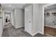 Bright hallway with linen closet and laundry area at 3628 Planck Cir, Danville, IN 46122