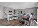 Modern kitchen with stainless steel appliances and an island with seating at 3628 Planck Cir, Danville, IN 46122