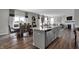 Modern kitchen with stainless steel appliances and an island with seating at 3628 Planck Cir, Danville, IN 46122