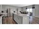 Modern kitchen with stainless steel appliances and an island with seating at 3628 Planck Cir, Danville, IN 46122