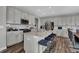 Modern kitchen with stainless steel appliances and an island with seating at 3628 Planck Cir, Danville, IN 46122